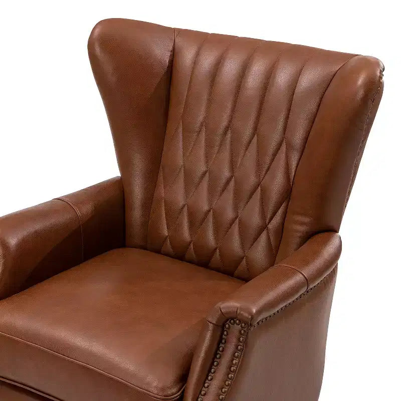 Fauteuil à oreilles en cuir véritable avec clous décoratifs et pieds fuselés en bois massif