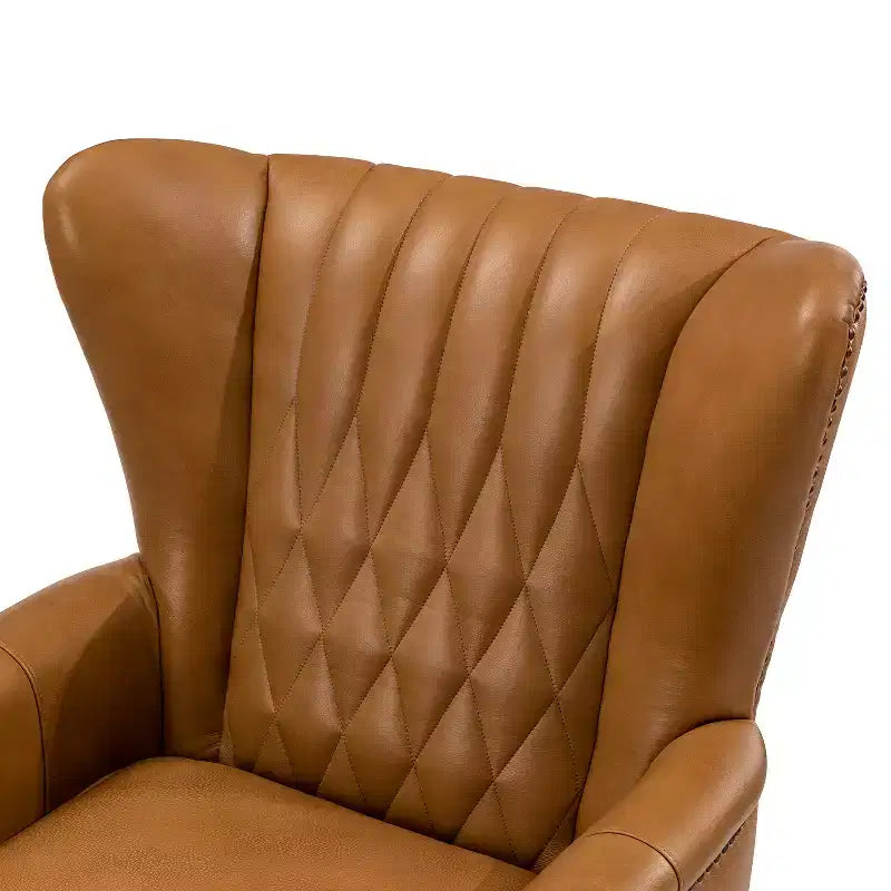 Fauteuil à oreilles en cuir véritable avec clous décoratifs et pieds fuselés en bois massif